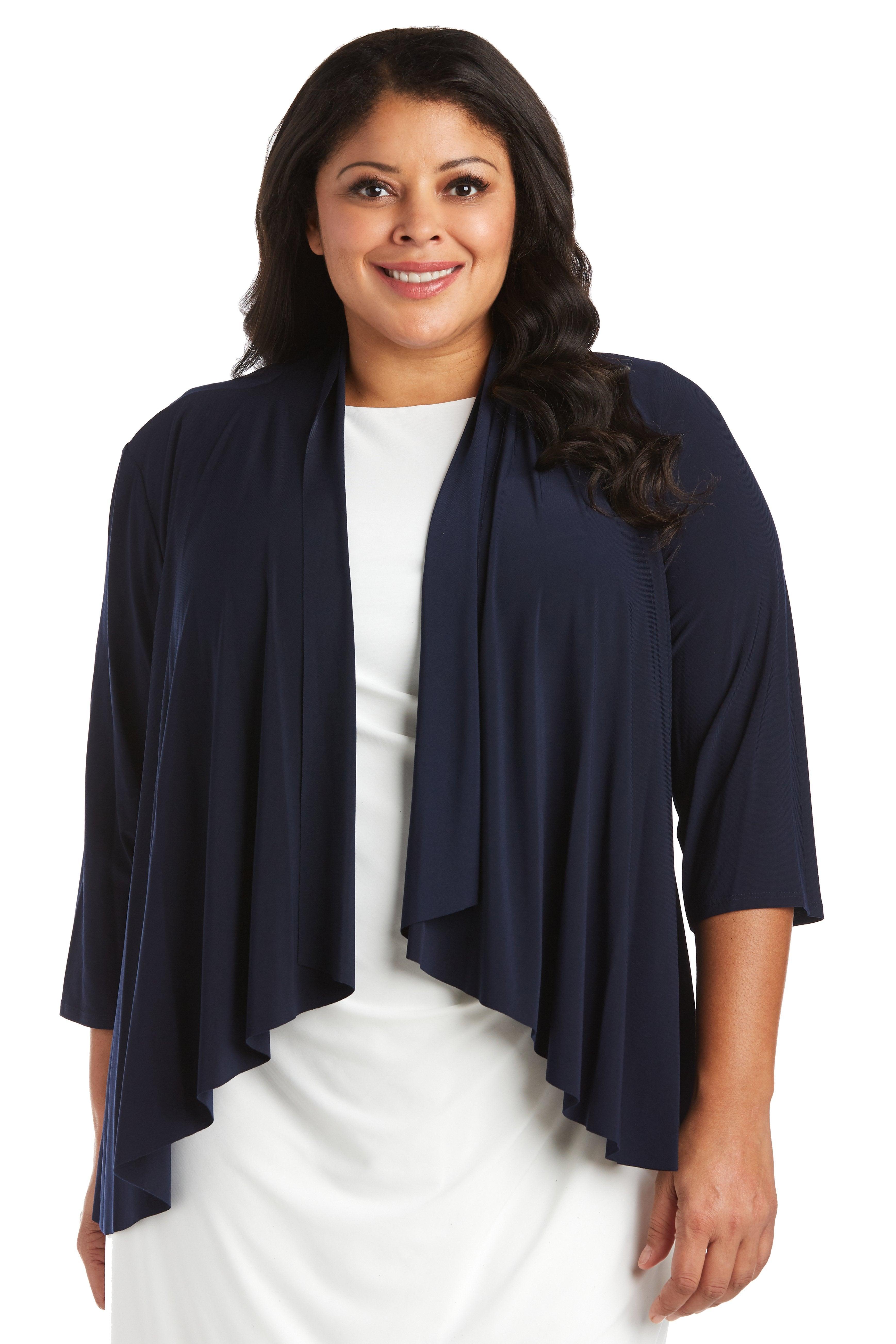 <p data-mce-fragment="1">This elegant swing shrug a jacket that offers perfect coverage<span data-mce-fragment="1">. This is perfect for any special occasion.</span></p> <p> </p> <p>Available in <strong><a title="Regular Size" href="https://%20/products/r-m-richards-swing-shrug-8244"><span style="text-decoration: underline; color: #00aaff;">Regular Size</span></a></strong></p> <p> </p> <p> </p> <p data-mce-fragment="1"><strong data-mce-fragment="1">Fabric</strong><span data-mce-fragment="1"> </span>: Poly Spandex<br></p> <p data-mce-fragment="1"><strong data-mce-fragment="1">Sleeve Style</strong><span data-mce-fragment="1"> </span>: 3/4 Sleeve</p> <p data-mce-fragment="1"><strong data-mce-fragment="1">Colors</strong><span data-mce-fragment="1"> </span>: Black, Ivory, Navy</p> <p data-mce-fragment="1"><strong data-mce-fragment="1">Sizes</strong><span data-mce-fragment="1"> </span>: 1X, 2X, 3X</p>