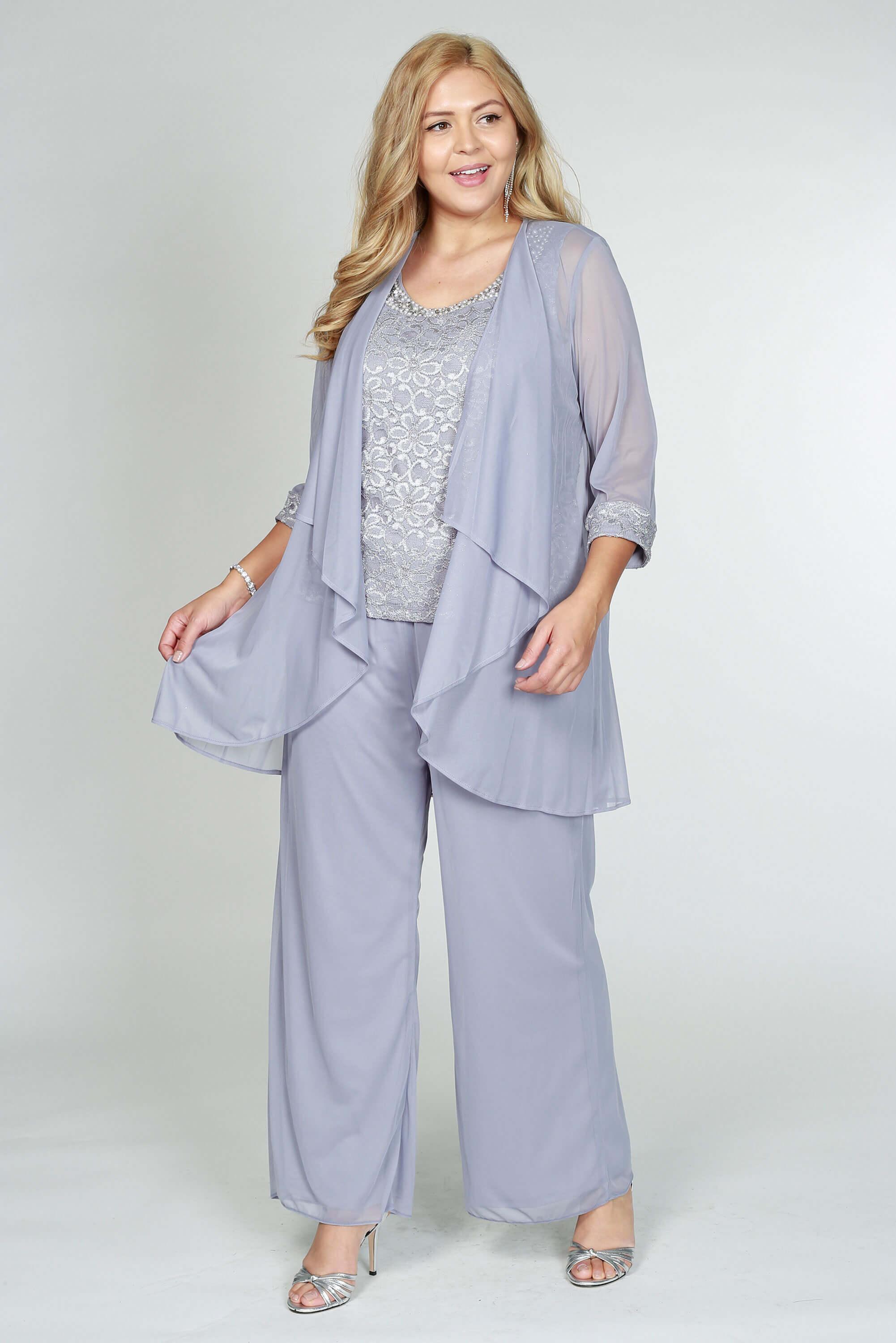 This plus size mother of the pant suit features a sleeveless scoop neckline with lace top and long sleeve jacket. Perfect for formal, evening party or any special occasion. <p> </p> <p>Available in <strong><a href="https://%20/products/r-m-richards-pant-suit-mother-of-the-bride-made-in-usa" title="Regular Size"><span style="text-decoration: underline; color: #99cce6;" ne="0.43798106003665094">Regular Size </span></a> and <strong><a href="https://%20/products/r-m-richards-petite-lace-pant-suit-made-in-usa-5008p" title="Petite Size"><span style="text-decoration: underline; color: #99cce6;" ne="0.8466351025068282">Petite Size</span></a> <br> </strong></strong></p> <br><br><strong>Fabric</strong> : Chiffon<br><br><strong>Length</strong> : Long<br><br><strong>Sleeve Style</strong> : Sleeveless<br><br><strong>Colors</strong> : Ivory, Champagne, Slate, Blush, Navy, Plum, Silver<br><br><strong>Sizes</strong> : 14W, 16W, 18W, 20W, 22W<br><br><strong>Fully Lined</strong><br><br><strong>Soft Cup Inserts</strong><br><br><strong>Occasion</strong> : Formal, Evening Party, Mother of the Bride, Mother of the Groom, Church, Wedding Guest