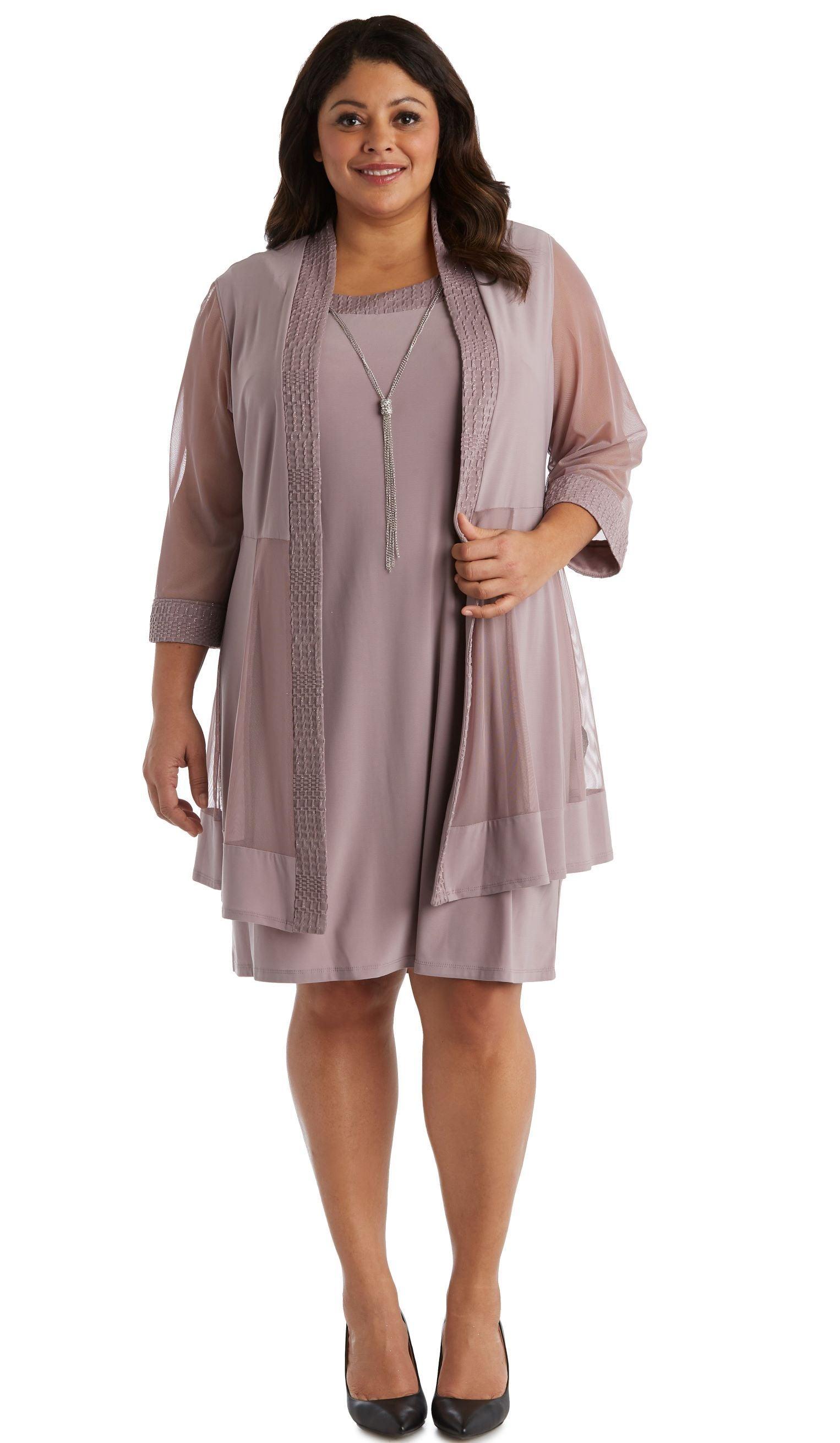 <p>This modest mother of the bride/groom short dress features sleeveless sheer sleeve jacket with trim.  Perfect for cocktail, evening party, and other special occasion.</p> <p> </p> <p>Available in <strong><a title="Petite Size" href="https://%20/products/r-m-richards-short-petite-jacket-dress-5394p"><span style="text-decoration: underline; color: #00aaff;">Petite Size </span></a> and <strong><a title="Regular Size" href="https://%20/products/r-m-richards-short-mother-of-the-bride-dress-5394"><span style="text-decoration: underline; color: #00aaff;">Regular Size</span></a> <br> </strong></strong></p>   <p> </p> <p><strong>Fabric</strong> : Poly Spandex</p> <p><br><strong>Length</strong> : 41 Inches<br><br><strong>Sleeve Style</strong> : Sleeveless<br><br><strong>Colors</strong> : Navy, Plum, Dark Green, Mauve, Royal Blue, Peacock<br><br><strong>Sizes</strong> : 14W, 16W, 18W, 20W, 22W<br><br><strong>Fully Lined</strong><br><br><strong>Soft Cup Inserts</strong><br><br><strong>Necklace Included</strong><br><br><strong>Occasion</strong> : Formal, Evening Party, Mother of the Bride, Mother of the Groom, Church, Wedding Guest</p> <p> </p>