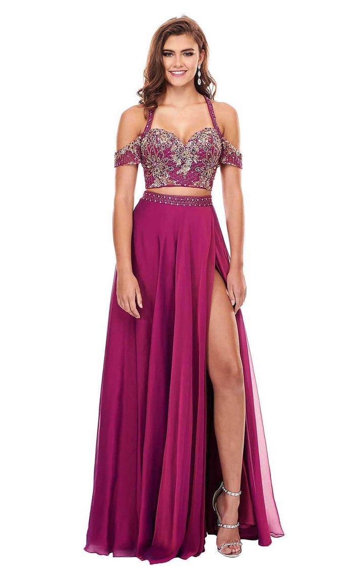 <p>A beautiful sexy  two-piece chiffon dress and embellished with floral appliques made of pearls. The crop top has a tapered strap that is worn over the shoulders with an open back and  a high slit.</p> <p> </p> <p>Fabric : Chiffon</p> <p>Zipper Back</p> <p>Length : Full Length</p> <p>Sleeve Style : Off Shoulder</p> <p>Colors : Magenta, Peacock Blue, Deep Periwinkle, Coral</p> <p>Sizes : 0, 2, 4, 6, 8, 10, 12 14, 16</p> <p>Fully Lined</p> <p>Occasion : Prom, Formal, Homecoming, Wedding Guest, Red Carpet, Pageant</p>