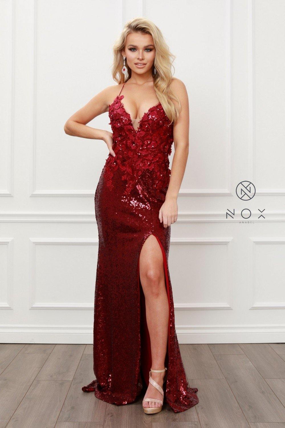 <p> </p> <p><span data-sheets-value="{&quot;1&quot;:2,&quot;2&quot;:&quot;Hello, glamour girl! If you're looking for a glam dress, we have you covered. V-neck lace bodice offset by sparkling silver waist details showcases your refined side. You’ll get lost in the dance floor or socializing thanks to this comfortable, flattering fit. Fully-lined tulle skirt rests at the knee. Available in black or royal blue.&quot;}" data-sheets-userformat='{"2":9153,"3":[null,0],"9":0,"10":1,"11":4,"12":0,"16":10}'>This gorgeous stunning long dress features a sSleeveless and fitted sequin gown with side slit.  Floor-length hemline completely decorated with sequins.</span> <span data-sheets-value='{"1":2,"2":"Short-cut! We took a best-selling long formal 2018 gown and hiked up the hem to skim the knee, perfectly for Homecoming! This ever-fabulous dress boasts a eye-catching sequined top in purple, black, silver, and cerulean blue. A sweetheart neckline compliments bra-friendly straps. Sheer tulle inset offers a hint of modesty for the plunging V-neckline. Chiffon skirt flows gracefully out from the empire waist. Wear this to Homecoming 2018 or any special occasion and be the talk of the town!"}' data-sheets-userformat='{"2":9153,"3":[null,0],"9":0,"10":1,"11":4,"12":0,"16":10}'>T</span>his dress is perfect for any special occasion.</p> <p> </p> <p>Sleeve Style : Sleeveless</p> <p>Length : Floor Length</p> <p>Color : Burgundy</p> <p>Sizes : 2, 4, 6, 8, 10, 12, 14, 16</p> <p>Fully Lined</p> <p>Occasion : Formal, Prom, Homecoming, Special Occasion</p> <p><span></span></p>