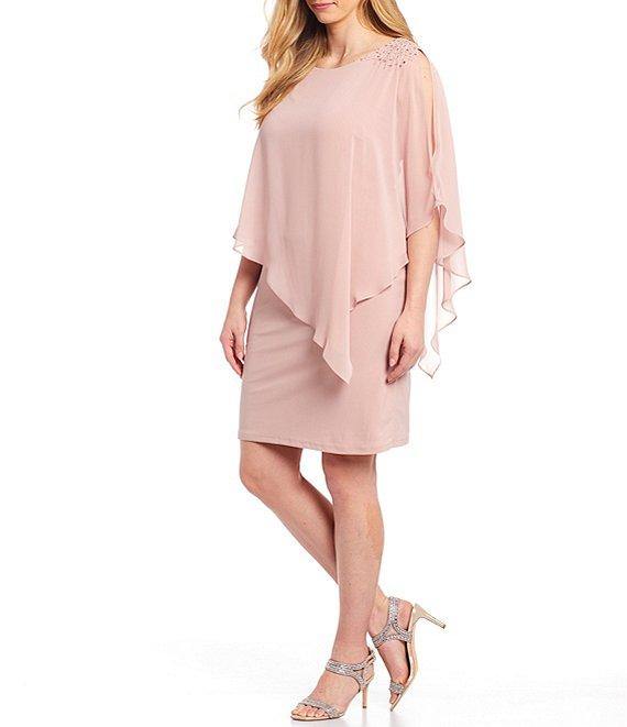 <p> </p> <p><span size="4" data-mce-fragment="1" rwr="1"><span data-mce-fragment="1"><span size="3" data-mce-fragment="1">This elegant short dress feautures a cape sleeve round neckline. Asymmetrical chiffon overlay with beaded shoulder detail. This dress is perfect for any special occasion</span></span></span></p> <p> </p> <p><span size="4" data-mce-fragment="1" rwr="1"><span data-mce-fragment="1"><span size="3" data-mce-fragment="1"><strong data-mce-fragment="1">Length</strong> : Knee Length</span></span></span></p> <p><span size="4" data-mce-fragment="1" rwr="1"><span data-mce-fragment="1"><span size="3" data-mce-fragment="1"><strong data-mce-fragment="1">Sleeve Style</strong> : Cape Sleeve</span></span></span></p> <p><span size="4" data-mce-fragment="1" rwr="1"><span data-mce-fragment="1"><span size="3" data-mce-fragment="1"><strong data-mce-fragment="1">Colors</strong> : Faded Rose, New Navy</span></span></span></p> <p><span size="4" data-mce-fragment="1" rwr="1"><span data-mce-fragment="1"><span size="3" data-mce-fragment="1"><strong data-mce-fragment="1">Sizes </strong>: 14W, 16W, 18W, 20W, 22W, 24W</span></span></span></p> <p><span size="4" data-mce-fragment="1" rwr="1"><span data-mce-fragment="1"><span size="3" data-mce-fragment="1"><strong data-mce-fragment="1">Fully Lined</strong></span></span></span></p> <p><span size="4" data-mce-fragment="1" rwr="1"><span data-mce-fragment="1"><span size="3" data-mce-fragment="1"><strong data-mce-fragment="1">Occasion</strong> : Formal, Evening Party, Church, Wedding Guest, Dinner Party, Special Occasion</span></span></span></p>