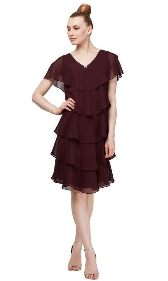 <p><strong>SL Fashions 1175251 Short Formal Dress Sale</strong> exquisite dress, embodies timeless elegance and sophistication.</p>
<p>Cascading stitched chiffon, tight lining and knee length gives the dress versatility, making it suitable for different occasions.</p>
<p>The bow sleeves, V-neck - create a captivating and ethereal look, allowing you to showcase your unique sense of style.</p>
<p>It is the perfect choice for formal events, weddings or any special occasion where you want to make a lasting impression.</p>
<p>All Sales Items are Final Sale!</p>
<p>Length : Knee Length</p>
<p>Sleeve Style : Butterfly Sleeve</p>
<p>Colors : Fig, Navy</p>
<p>Sizes : 14, 16, 18W</p>
<p>Fully Lined</p>
<p>Soft Cup Inserts</p>
<p>Occasion : Formal, Wedding Guest, Special Occasion</p>