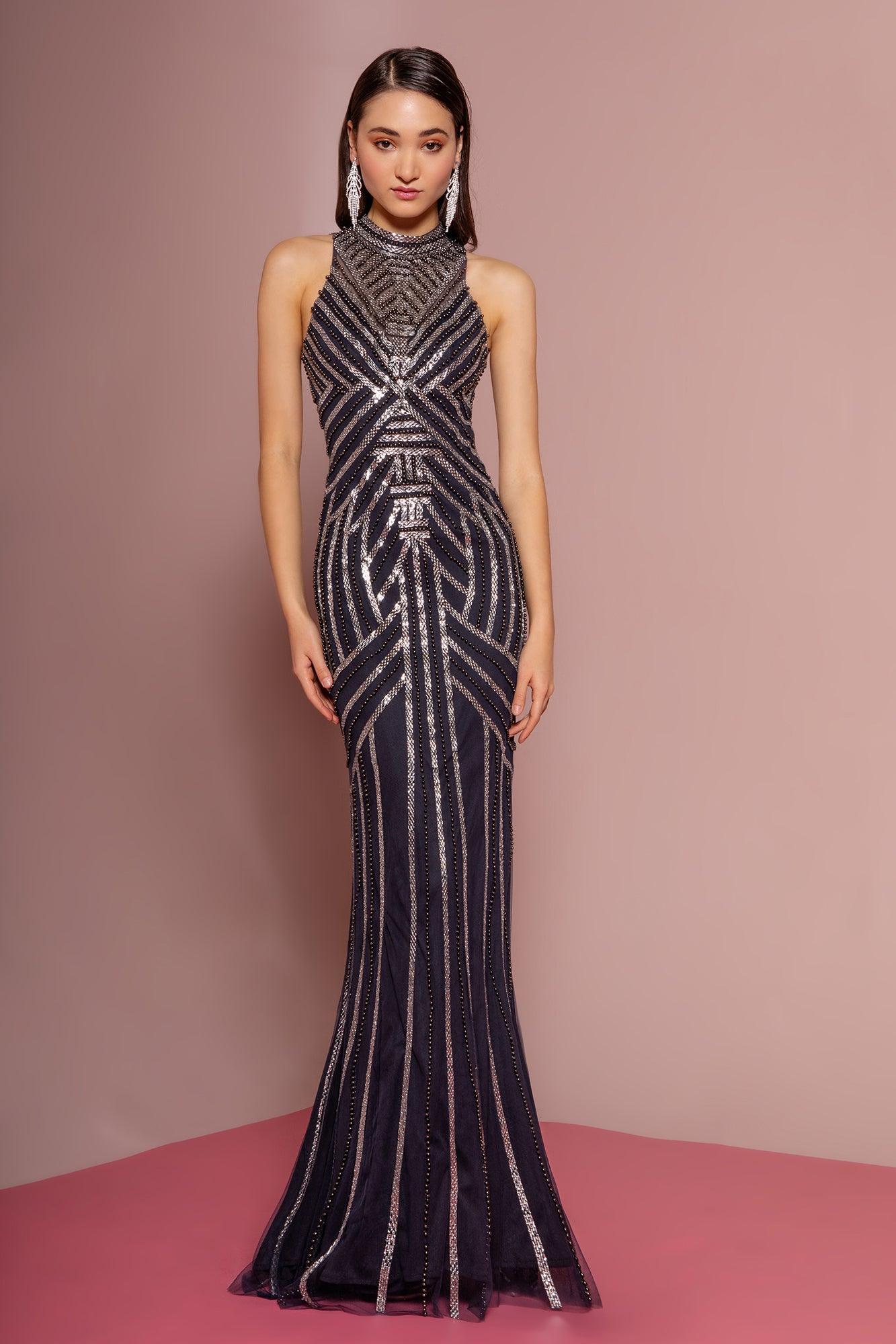 <p> </p> <p>This stunning long dress features <span>a sleeveless, high neckline with fitted bodice richly decorated with embellishments. The skirt has a fit and flare silhouette and runs in full length hem. </span><span> This dress is perfect for any special occasion.</span></p> <p> </p> <p>Closure : Back Zipper</p> <p>Sleeve Style : Sleeveless</p> <p>Color : Charcoal</p> <p>Sizes : XS, S, M, L, XL, 2XL, 3XL</p> <p>Fully Lined</p> <p>Occasion : Formal, Prom, Homecoming, Special Occasion</p> 