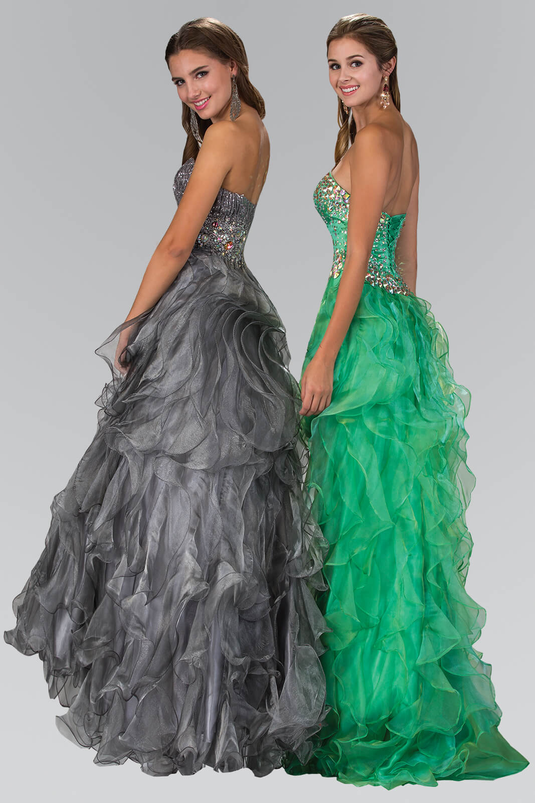 <p><br><span>This gorgeous long dress features a strapless sweetheart neckline with bodice fully decorated in jewel accents. The skirt flaunts a high-low length with ruffled details. This dress is perfect for prom party or any special occasion.</span></p> <p> </p> <p>Fabric : Organza<br><br>Closure : Back Zipper<br><br>Sleeve Style : Strapless<br><br>Colors :  Silver, Coral<br><br>Sizes : XS, S, M, L, XL, 2XL<br><br>Fully Lined<br><br>Occasion : Formal, Prom, Homecoming, Special Occasion</p> 