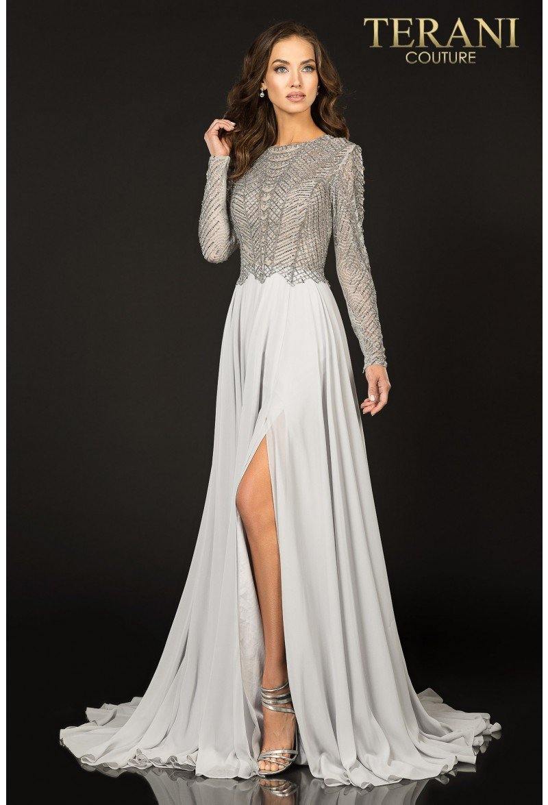 <p> </p> <p><span data-mce-fragment="1">This elegant long dress features a long sleeve crew neckline. Sparkling appliques trace a shirttail edge along the hips. A close fit defines an iconic silhouette while gossamer gathers shape the full-length skirt. This dress is perfect for any occasion.</span></p> <p> </p> <p><span data-mce-fragment="1">Length : Full Length</span><br data-mce-fragment="1"><br data-mce-fragment="1"><span data-mce-fragment="1">Sleeve Style : Long </span><span data-mce-fragment="1">Sleeve</span><br data-mce-fragment="1"><br data-mce-fragment="1"><span data-mce-fragment="1">Color : Antique Silver, Blush, Hunter Green</span><br data-mce-fragment="1"><br data-mce-fragment="1"><span data-mce-fragment="1">Sizes : 0, 2, 4, 6, 8, 10, 12, 14, 16, 18, 20, 22, 24</span><br data-mce-fragment="1"><br data-mce-fragment="1"><span data-mce-fragment="1">Fully Lined</span><br data-mce-fragment="1"><br data-mce-fragment="1"><span data-mce-fragment="1">Occasion : Formal, Prom, Homecoming, Wedding Guest, Red Carpet, Pageant, Special Occasion</span></p>