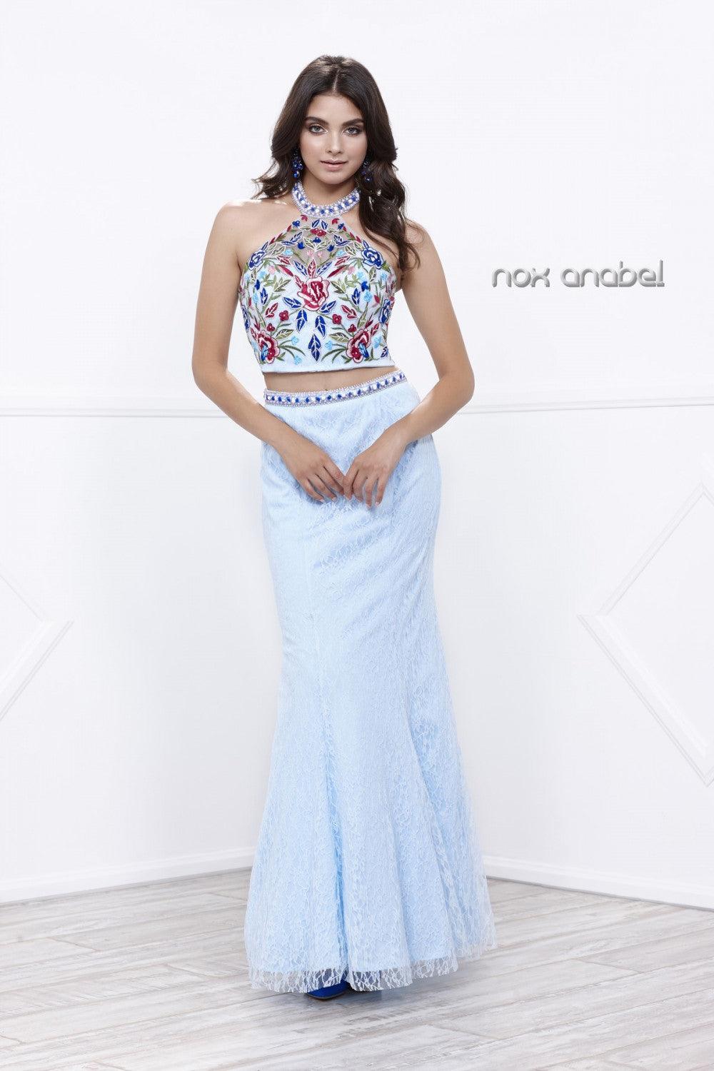 <p> </p> <p>This gorgeous long dress features a t<span>wo piece set long prom and evening gown includes floral design embroidered cropped top with halter neck, low back and beaded collar. Full length lace overlaid skirt with flared hem. Gemstones embellished waistline and zipper back closure.</span><span>This dress is </span><span>perfect for prom party or any special occasion.</span></p> <p> </p> <p>Closure : Zipper Back</p> <p>Length : Floor Length</p> <p>Sleeve Style : Halter</p> <p>Colors : Aqua Blue, Baby Pink, White</p> <p>Sizes : XS, S, M, L, XL, 2XL</p> <p>Fully Lined</p> <p>Occasion : Formal, Prom, Homecoming, Special Occasion</p> 